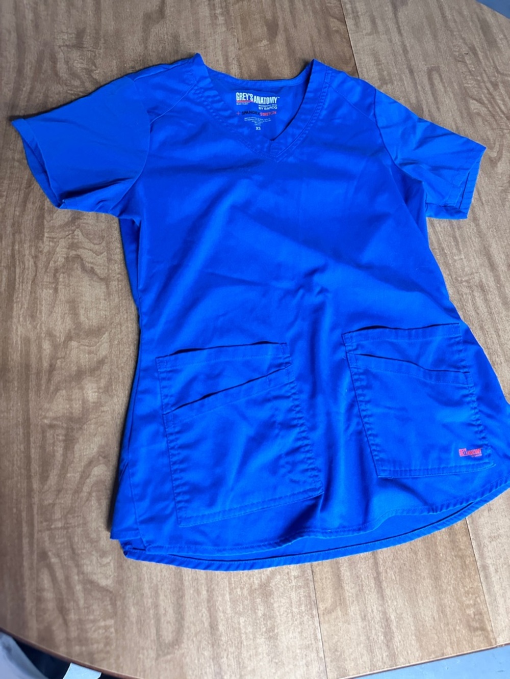 Grey's Anatomy Women's Short-Sleeve V-Neck Top in Bright Blue